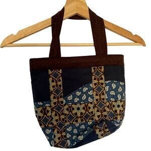 Brown blue quilted handbag fabric magnetic closure multiple pockets vintage